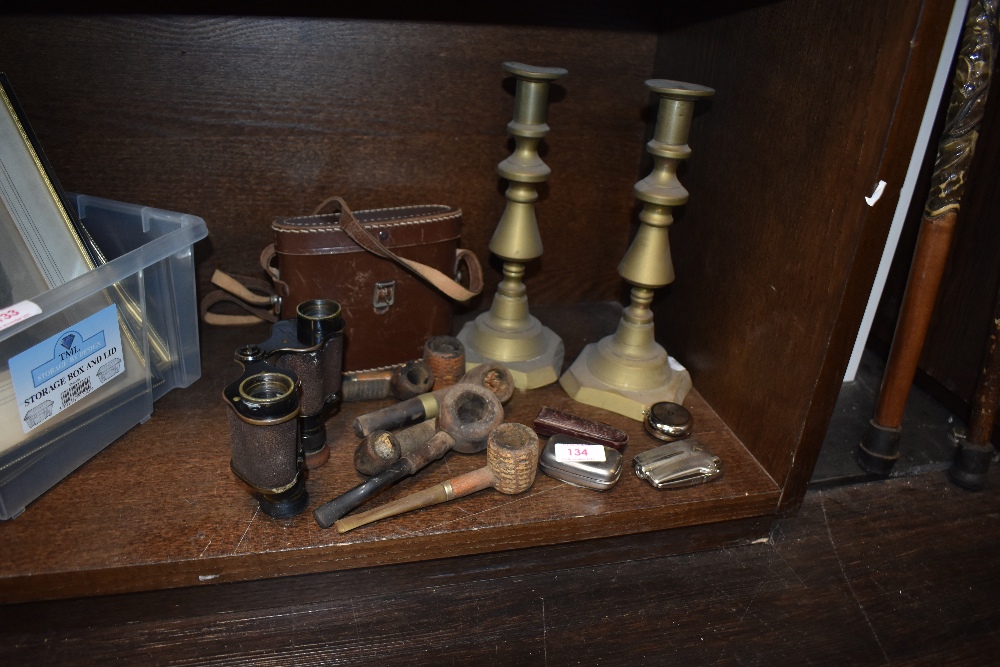 A selection of tobacco smokers pipes, Negretti Zamba binoculars and a pair of candle sticks