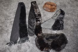 A vintage mink muff, a selection of mole skin and velvet/chenille tippets and scarves also a black