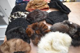A large quantity of mixed fur hats including mink,fox and astrakhan, various styles and sizes.