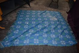 A blue,white and green wool Welsh blanket 'A dyffryn product,Cymryu am Byth'.
