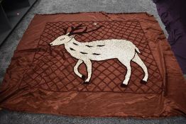 A vintage brown candlewick throw having deer to centre and fringing to edges 'Meghalaya products,