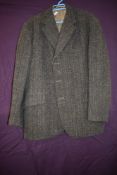 A 1970s gents Harris tweed jacket,AF, sleeve linings removed.