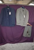 A gents Skopes wool blend suit with tags and a Centaur blazer new with tags.