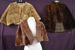 Three vintage fur capes.