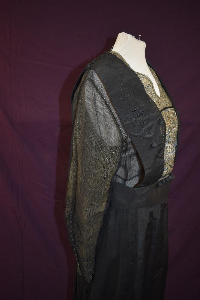 An early 20th century black taffeta tea dress having panels of georgette to sides with st - Image 3 of 10