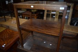 A vintage mahogany tea table of rectangular form with undertier, approx. 61 x 41cm, and a