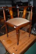 An early 20th Century mahogany and inlaid corner chair