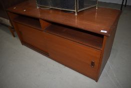 A vintage teak low sideboard/hifi unit, width approx. 126cm