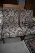 A pair of interesting 19th Century low seat nursing chairs having wood frame with H stretcher and