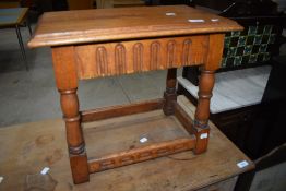 A golden oak refectory style occasional table, in the Priory style, approx. 48 x 30cm, height 43cm