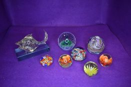 A selection of art glass paper weights including millefiori and Caithness