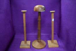 Three hat stands including a turned teak wood example