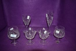 A selection of named glass wares including Tudor dessert glasses, two Bohemia brandy glasses and