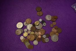 A selection of collectable coins and currency