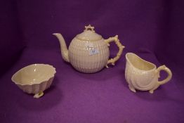 A part tea service by Belleek comprising of tea pot creamer and sugar bowl