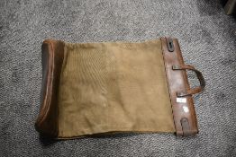 A vintage post masters saddle bag