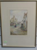 A watercolour, Edith E Martin, village scene, signed and attributed verso, 26 x 17cm, plus frame and