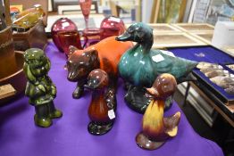 A selection of drip glazed figures including ducks and bear