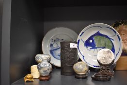 A selection of Chinese and oriental items including brush pot, miniature vases and Bee style