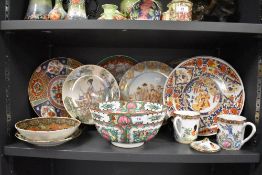 A collection of oriental plates, bowls,cups and similar.