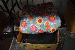 A vintage style Cath Kidson sleeping bags and modern Aztec mummy style sleeping bag