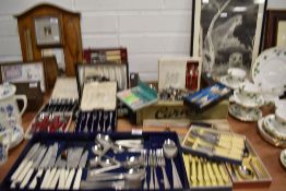 A selection of boxed cutlery and flatware etc