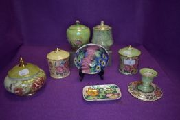 An assortment of lustre and similar ceramics including Maling and Kensington ware.