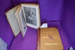 Two bound volumes of with the flag to Pretoria