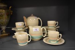 An art deco part tea service by Susie Cooper in the wedding band design