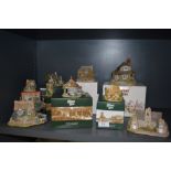 A selection of Lilliput lane model houses and cottages including boxed examples