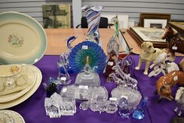 A selection of art glass figures and sculptures including Murano style vase