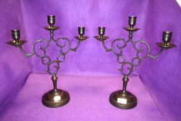 A pair of impressive bronze candle stick holders.
