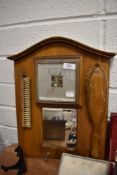 A vintage dressing mirror and brush set