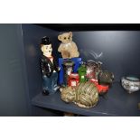 A selection of ceramic and metal money box and piggy banks
