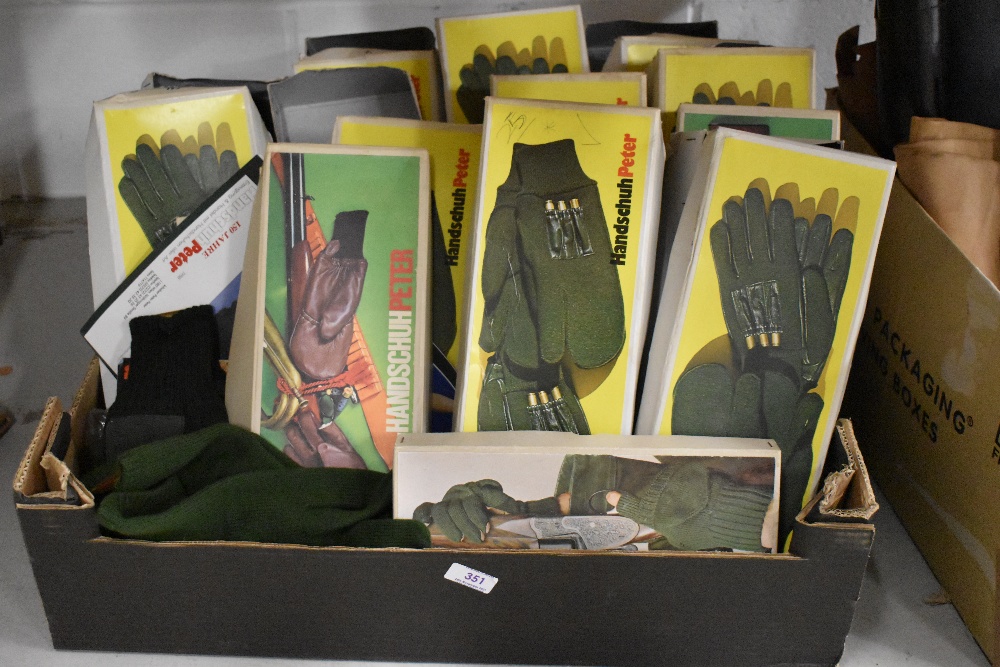 A selection of hunting or outdoor activity gloves