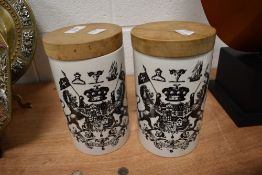 A pair of kitchen storage jars by Thomas Robson from the British Herald