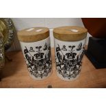 A pair of kitchen storage jars by Thomas Robson from the British Herald