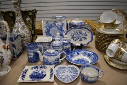 A selection of blue and white wear ceramics including Ringtons jar