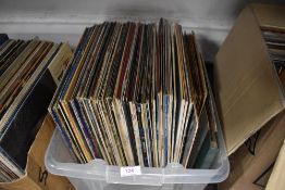 A selection of vinyl records and albums including general interest 70 records