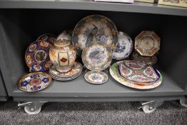 A selection of Chinese style ceramics including plates and ginger jar