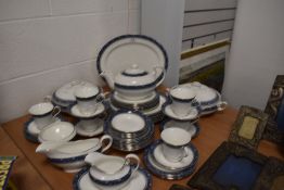 A part tea service by Aynsley in the Blue Mist design