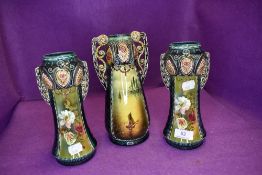 A ceramic mantle garniture set late Victorian