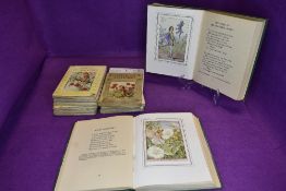 A collection of vintage flower fairies books.