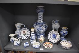 A selection of Dutch delft and similar style ceramics including large hand decorated tulip shape