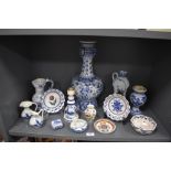 A selection of Dutch delft and similar style ceramics including large hand decorated tulip shape