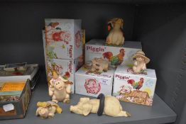 A selection of Piggin figures most having boxes