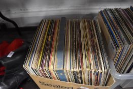 A selection of vinyl records and albums including pop interest 80 records