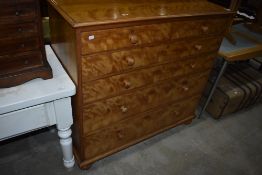 A 19th Century satinwood chest of two over four graduated drawers , on bun feet, width approx.