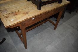 A traditional sycamore and ash side table in a rustic condition, width approx. 124cm