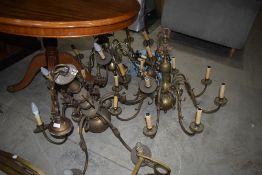A selection of vintage brass ceiling light and wall light fittings